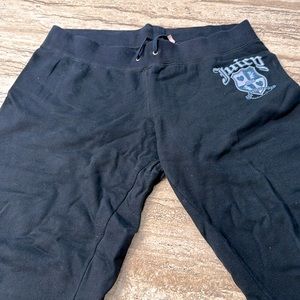 Black 98% cotton 2% poly. Style model 5609 extra large.